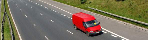 Red Ford Transit Van on Motorway